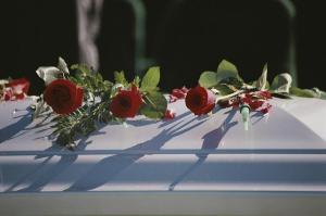 roses-cover-the-casket-of-an-officer-stephen-st-john